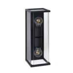 Die Außenwandleuchte - Tina ist eine moderne und minimalistische rechteckige schwarze Laterne mit transparenten Glasseiten und zwei vertikal ausgerichteten, freiliegenden Glühlampen, die in ihrem Rahmen prominent zur Geltung kommen.