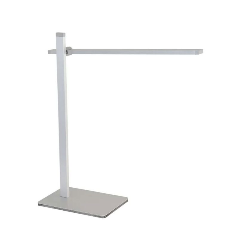 Die Tischleuchte - Leve ist eine moderne silberne Lampe mit einem schlanken, minimalistischen Design. Sie verfügt über einen dünnen rechteckigen Sockel und einen verstellbaren langen Arm aus Metall und verkörpert eine schlichte und zeitgenössische Ästhetik.