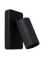 Die Wandleuchte – Icon von Licht Factory ist eine moderne, schwarze Wandleseleuchte mit einem gerippten, zylindrischen Schirm und einem schlanken, rechteckigen Sockel.