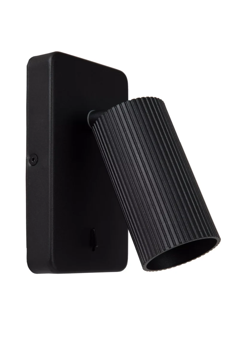 Die Wandleuchte – Icon von Licht Factory ist eine moderne, schwarze Wandleseleuchte mit einem gerippten, zylindrischen Schirm und einem schlanken, rechteckigen Sockel.