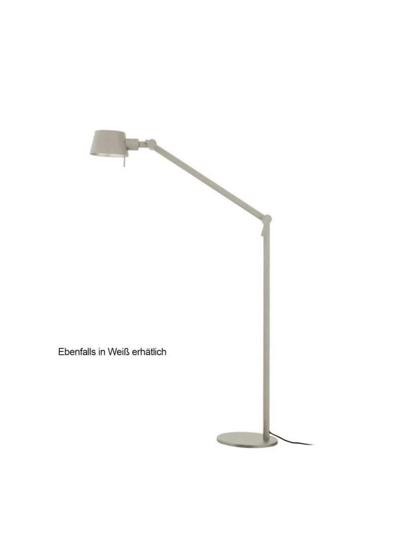 Minimalistische Stehleuchte, Stehleuchte - Mel, auf weißem Hintergrund mit langem verstellbarem Arm und rundem Sockel. Mit der Aufschrift „Ebenfalls in Weiß erhältlich“, um anzuzeigen, dass es in Weiß erhältlich ist.